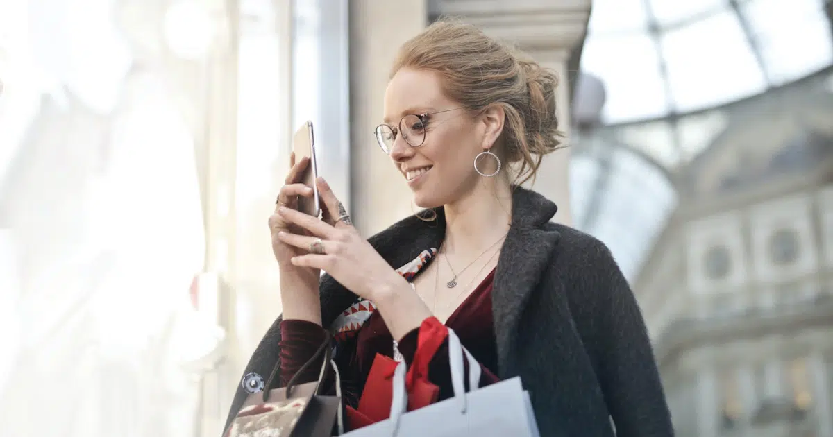 woman luxury shopping on smartphone